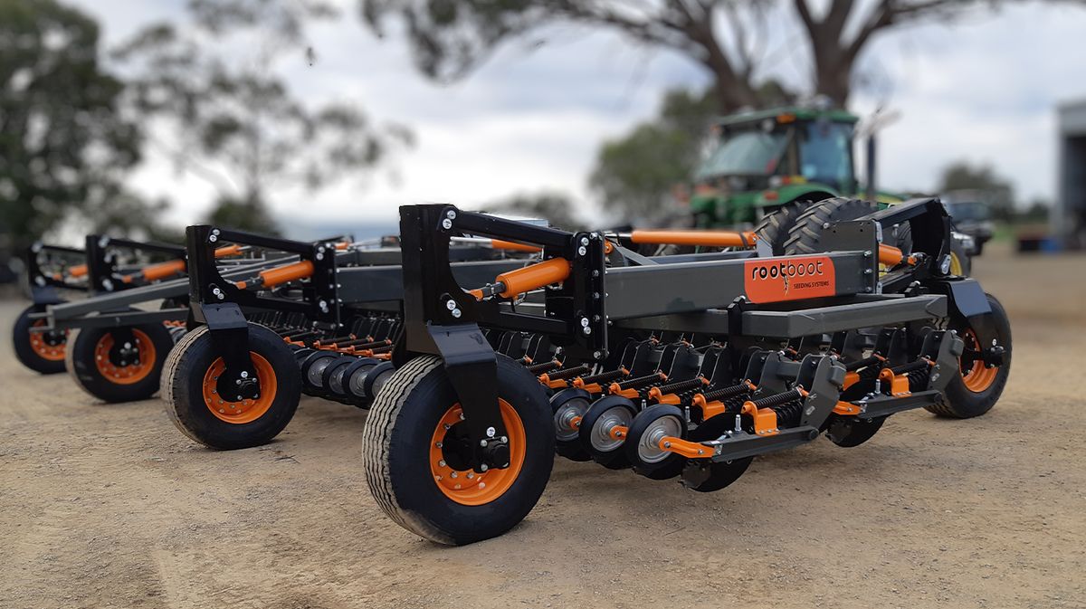 Rootboot seeding boots fitted to a tyned seeder bar